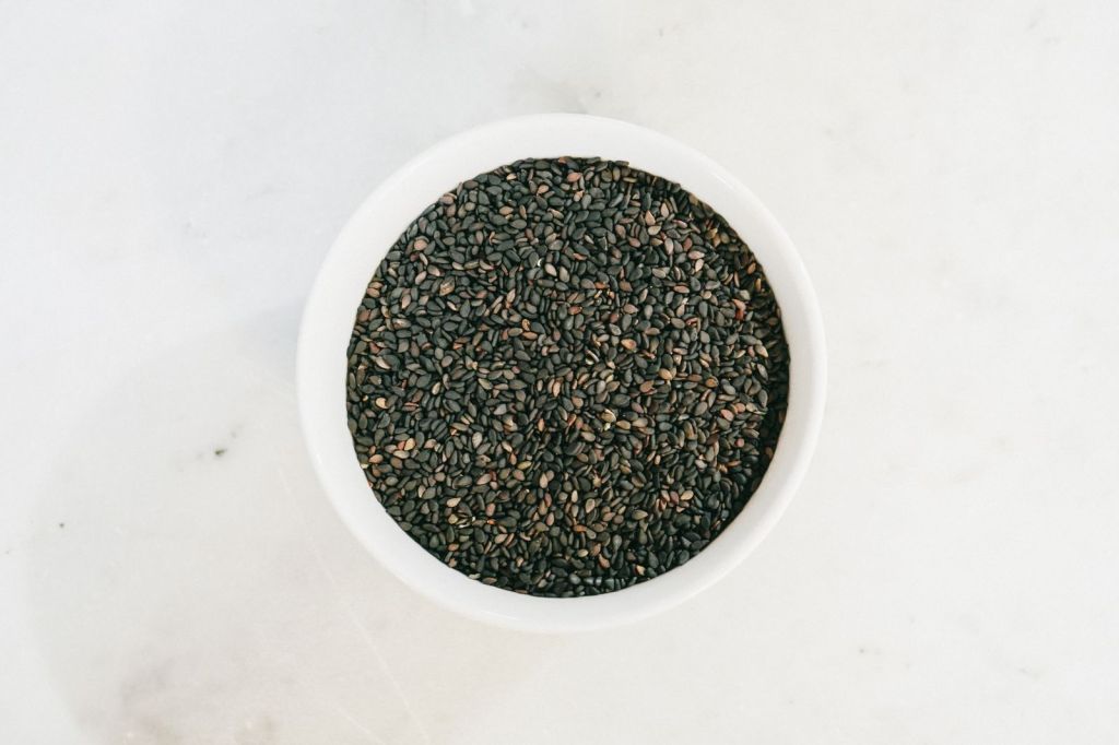 Black sesame seeds (heugimja) in a white bowl