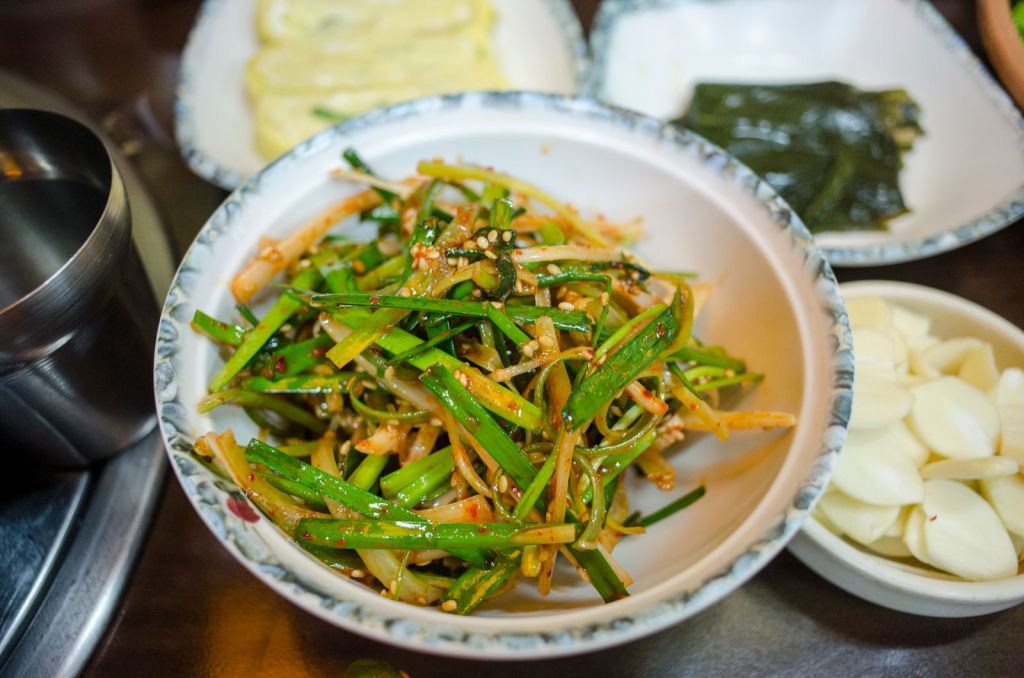 Korean spicy seasoned vegetable side dish (muchim) in a white bowl